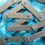 Цепь ступеней эскалатора, KONE, 13RI-A, шаг - 133,33 мм, палец - 74,5x12,8/12,5 мм, пластины - 35x4/35x4 мм, ролик - 75x23,5 мм, 105 kN (комплект на 10 ступеней)